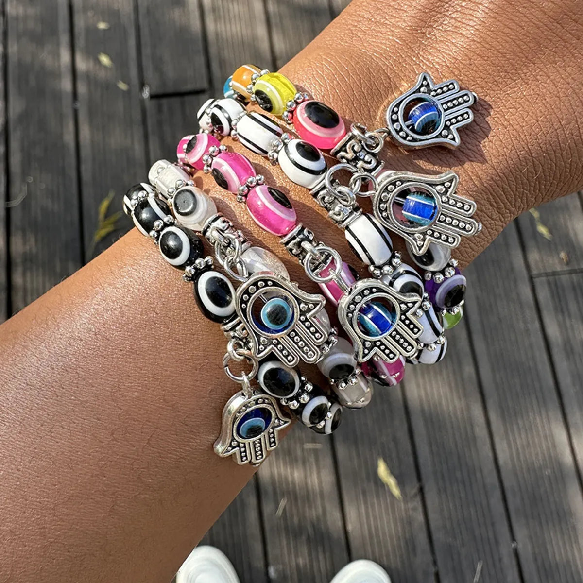 Casual Hip-Hop Devil's Eye Alloy Plastic Plating Unisex Bracelets