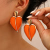 Casual Holiday Style Colormatching Love Paint Exaggerated Metal Heartshaped Earrings With Electroplating For Women
