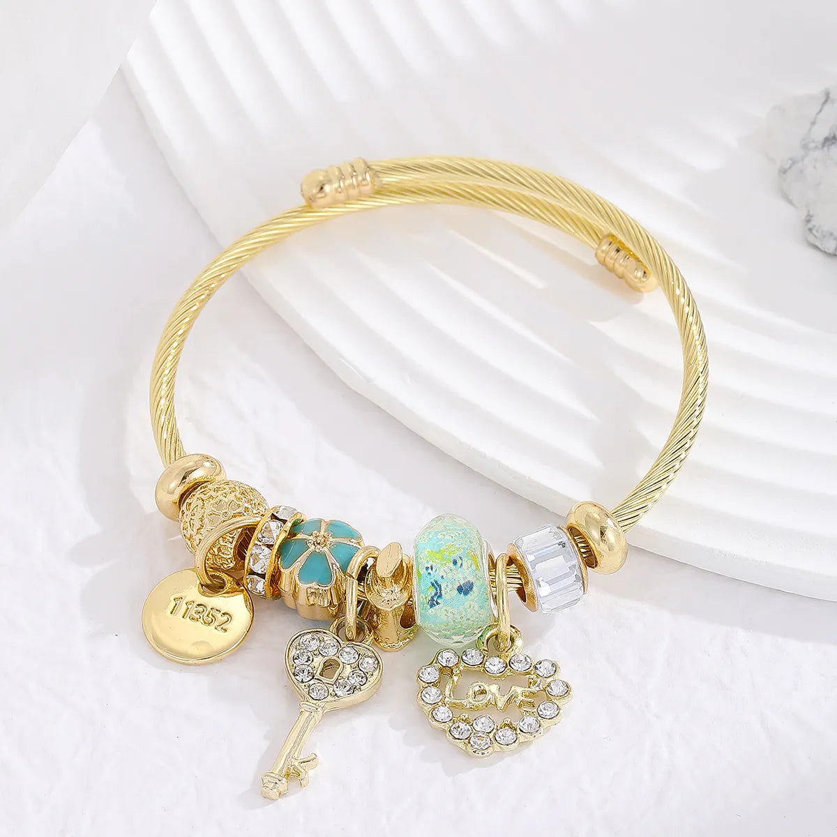 Casual Modern Style Classic Style Devil'S Eye Bear Key 304 Stainless Steel Alloy Gold Plated Artificial Crystal Rhinestones Bangle In Bulk