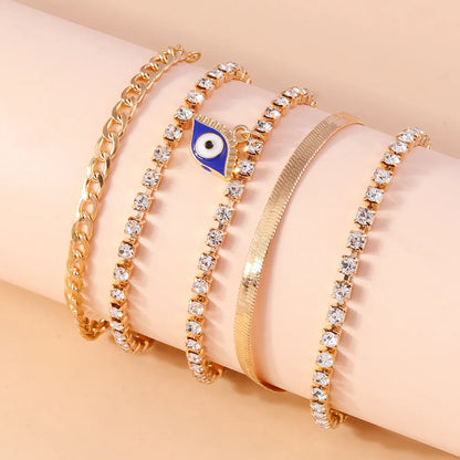 Casual Modern Style Devil'S Eye Palm Zinc Alloy Enamel Hollow Out Inlay Rhinestones Women'S Bracelets