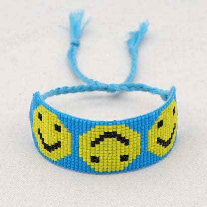 Casual Peach Eye Smile Face Glass Beaded Braid Woven Belt Women'S Bracelets