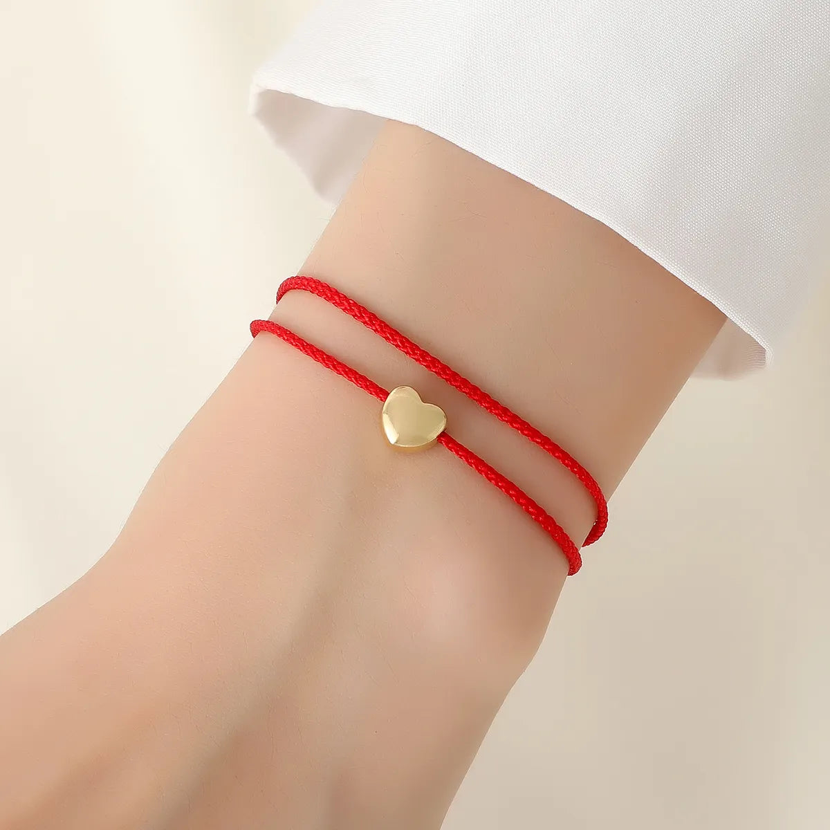 Casual Simple Style Four Leaf Clover Heart Shape Alloy Rope Copper Braid Unisex Bracelets Anklet