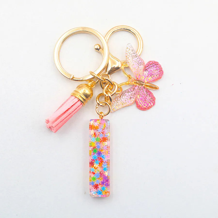 Casual Simple Style Letter Flower Butterfly Plastic Resin Sequins Epoxy Bag Pendant Keychain