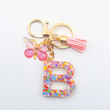 Casual Simple Style Letter Flower Butterfly Plastic Resin Sequins Epoxy Bag Pendant Keychain