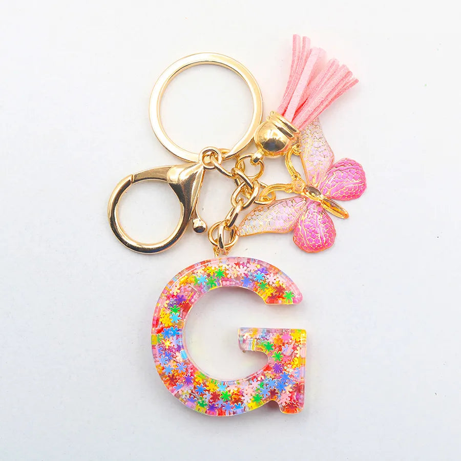 Casual Simple Style Letter Flower Butterfly Plastic Resin Sequins Epoxy Bag Pendant Keychain