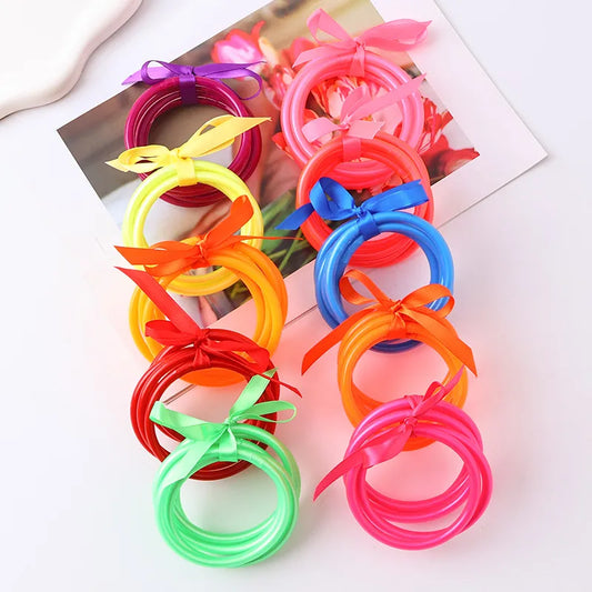 Casual Simple Style Solid Color Bow Knot Plastic Gold Foil Women'S Wristband