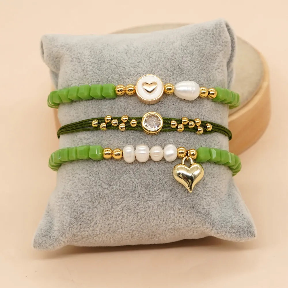 Casual Vacation Heart Shape Eye Smile Face Rope Copper Beaded Braid Inlay Zircon Women'S Bracelets