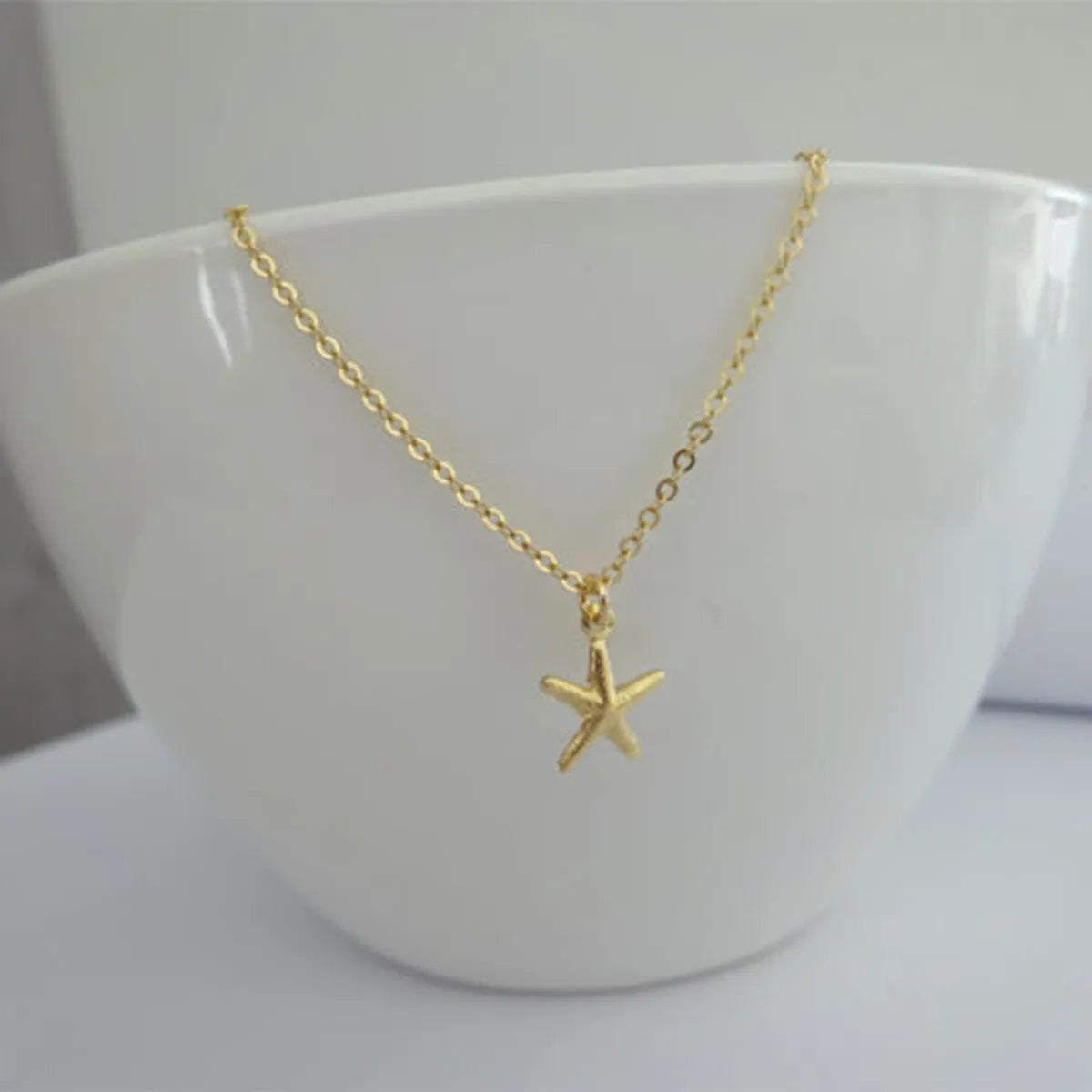 Commute Starfish Gold Plated Alloy Wholesale Pendant Necklace