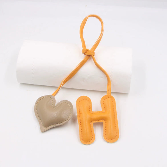 Contrast Color Letter Love Artificial Leather Bag With Diy Knot Lanyard Pendant Accessories Featuring Little Bear Pig Small Animal Patterns And Electroplating Processing