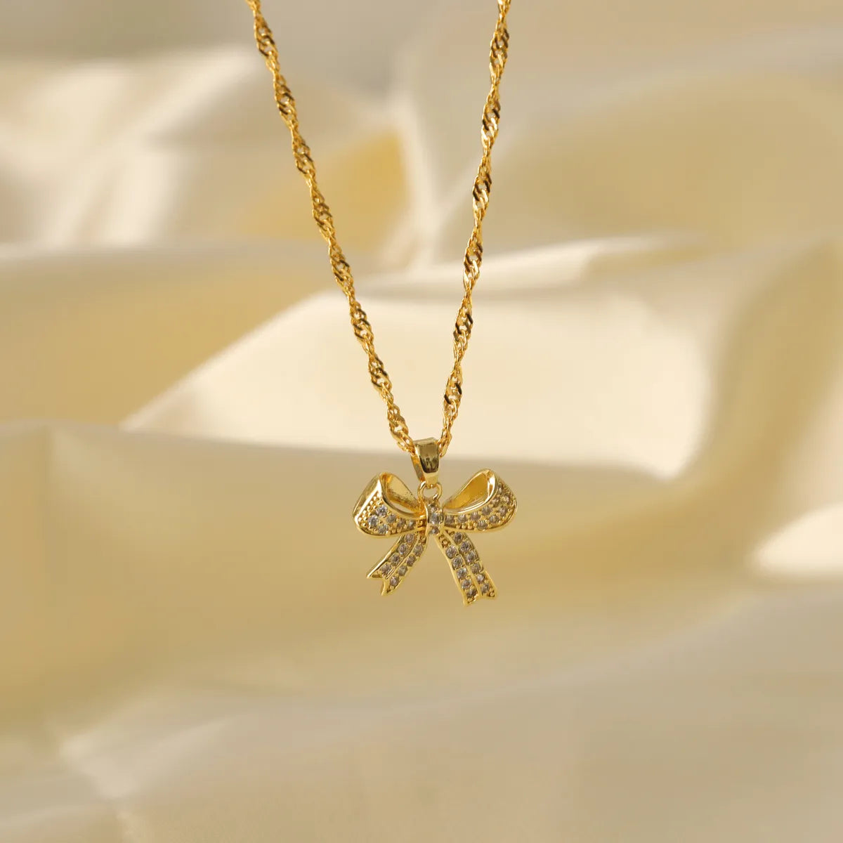 Copper 14K Gold Plated 18K Gold Plated Simple Style Classic Style Plating Inlay Bow Knot Zircon Pendant Necklace