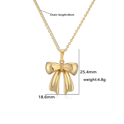 Copper Casual Elegant Simple Style Inlay Bow Knot Artificial Pearls Zircon Pendant Necklace