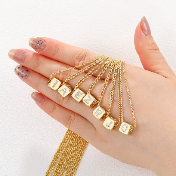 Copper Set Zircon Inlaid Dice Pendant Necklace With Letters Numbers Text Pattern And String Of Pearls Chain