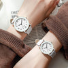 Couple Casual Alloy Quartz Watch With Round Dial Stainless Steel Clasp Genuine Leather Strap Mineral Strengthened Glass Mirror