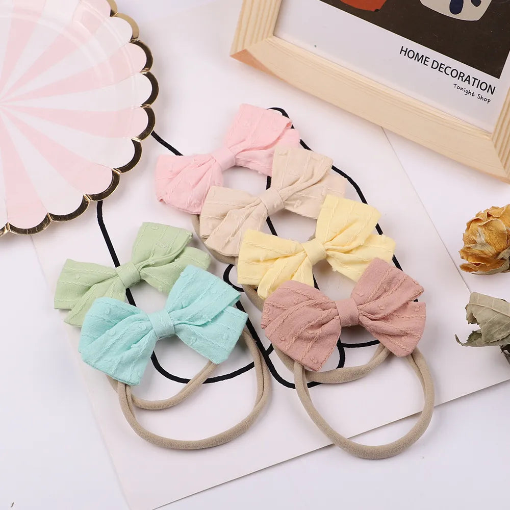 European And American Children'S Bow Hair Band Infants Baby Super Soft Nylon Headband Candy Color Hair Accessories Wholesale