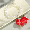 Cute Classic Style Animal Cat Bell Gold Plated Imitation Pearl Wood Porcelain Wholesale Bracelets