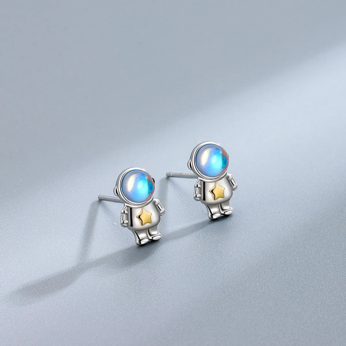 Cute Creative Astronaut Pattern Moonstone Alloy Stud Earrings Wholesale