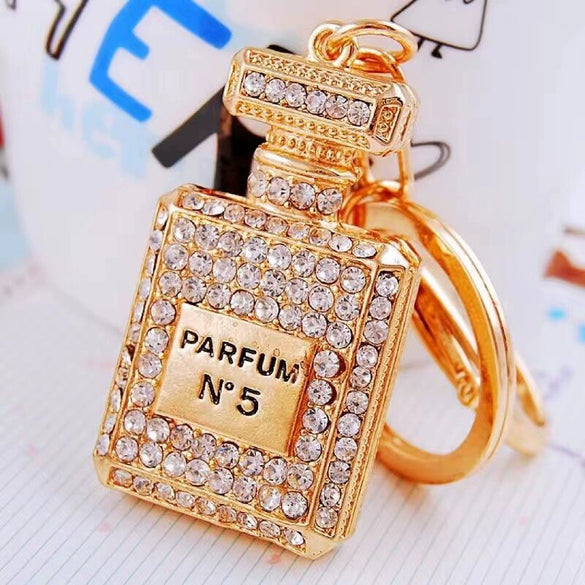 Cute Creative Pearl Bow Perfume Bottle Shaped Metal Keychain For Women As Bag Pendant Or Key Ring Diamond Gifts