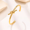 Cute Knot Titanium Steel Gold Plated Cuff Bracelets In Bulk