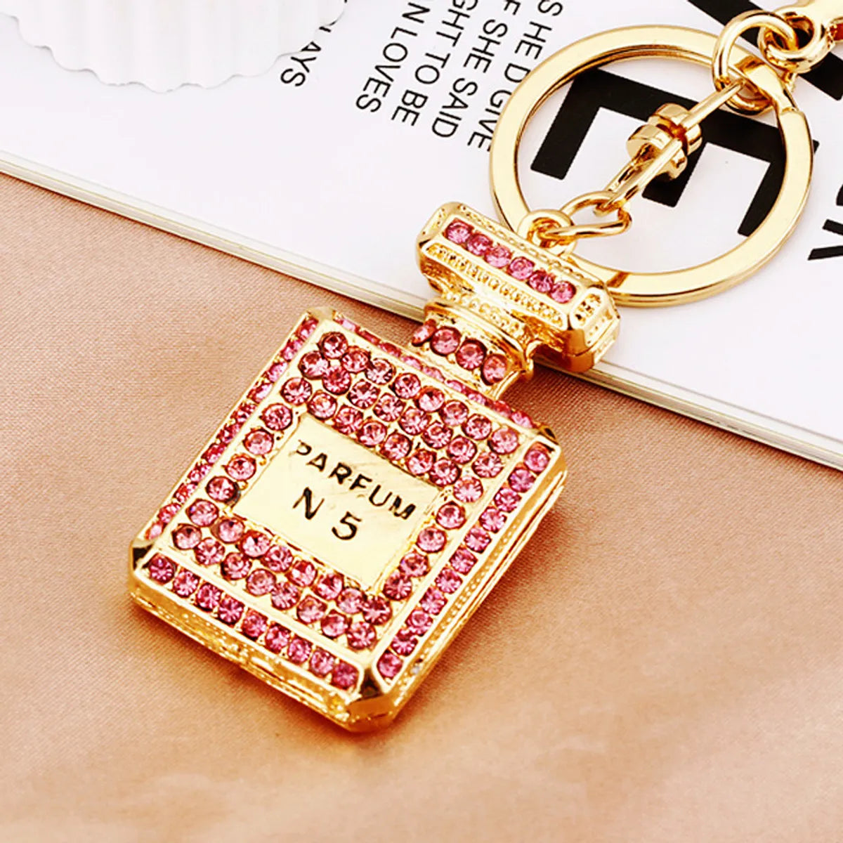 Cute Letter Bow Knot Perfume Bottle Metal Women'S Keychain