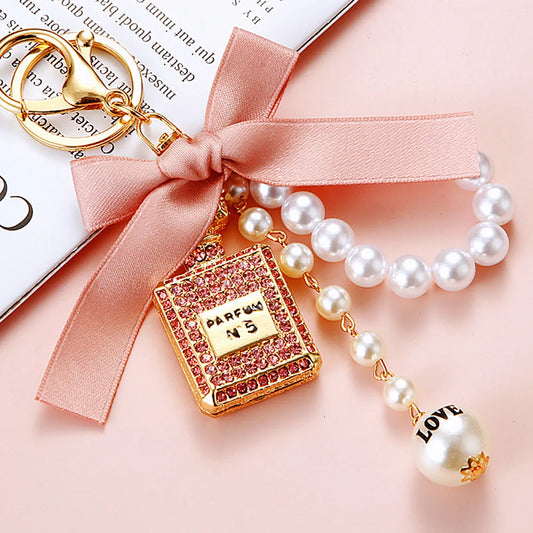 Cute Letter Bow Knot Perfume Bottle Metal Women'S Keychain