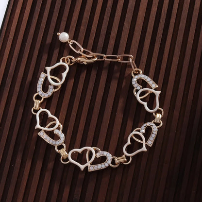 Cute Romantic Shiny Heart Shape Alloy Inlay Rhinestones 18k Gold Plated Women'S Bracelets