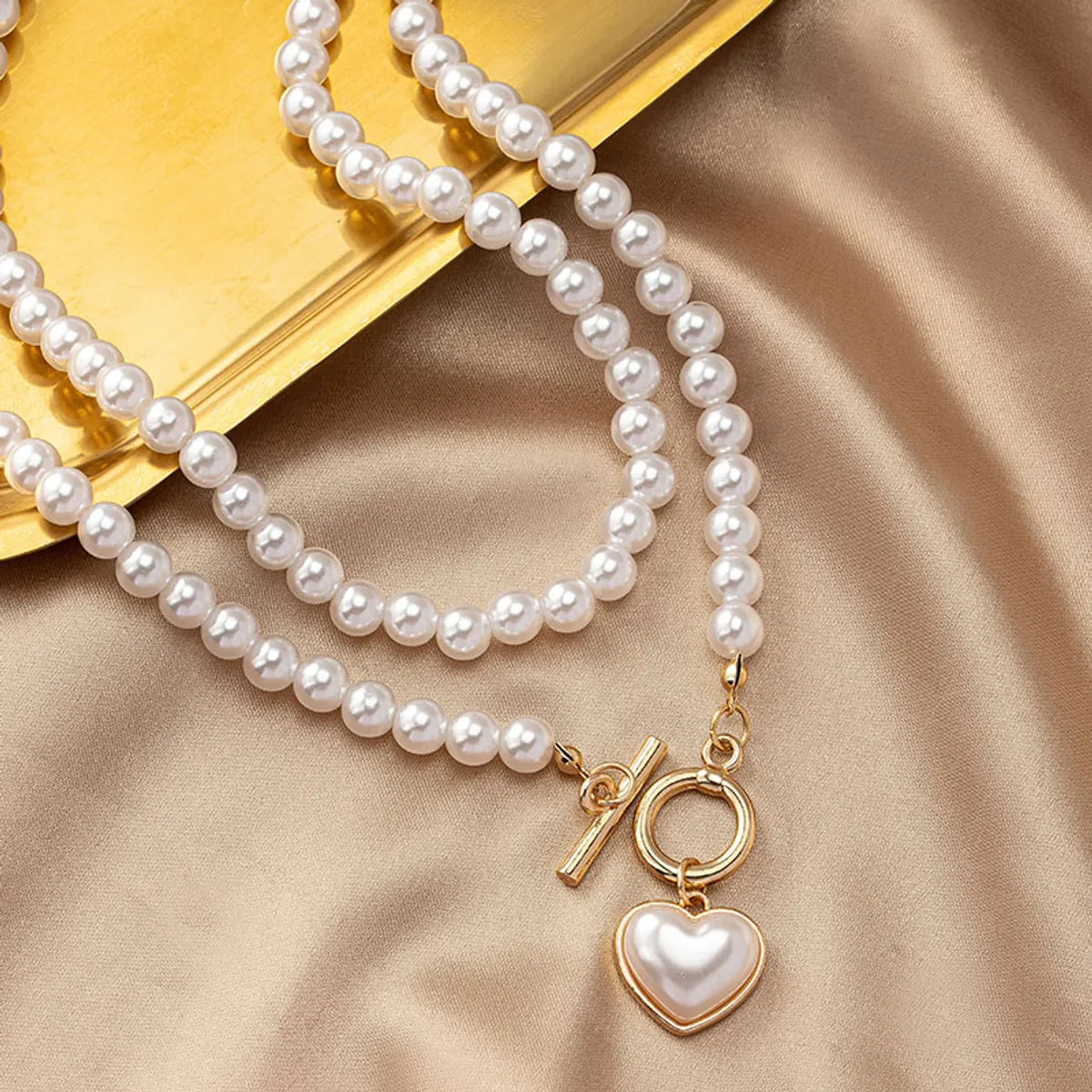 Elegant Classical Heart Shape Artificial Pearl Alloy Beaded Plating Women's Pendant Necklace