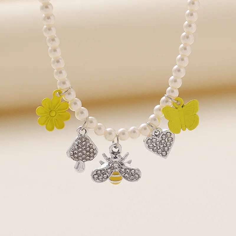 Elegant Cute Beach Fruit Beetles Bow Knot Rhinestones Imitation Pearl Alloy Wholesale Pendant Necklace