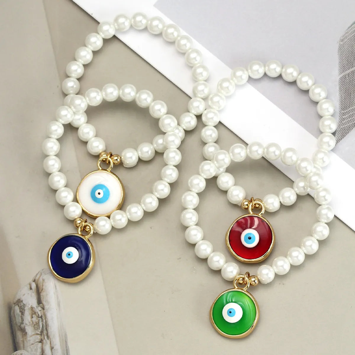 Elegant Devil'S Eye Heart Shape Artificial Pearl Glass Copper Wholesale Bracelets