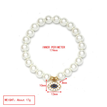 Elegant Devil'S Eye Heart Shape Artificial Pearl Glass Copper Wholesale Bracelets