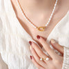 Elegant Fashion Titanium Steel And Freshwater Pearl Pendant Necklace And Bracelet Jewelry Suit With Electroplating