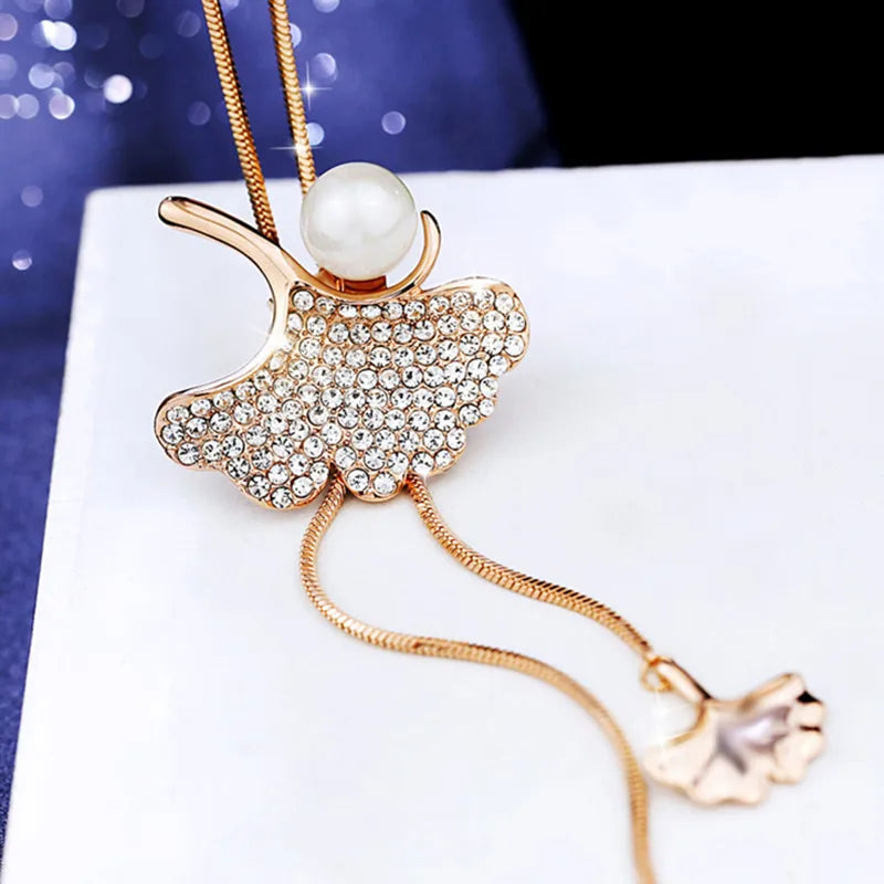 Elegant Ginkgo Leaf Alloy Inlay Artificial Pearls Glass Women'S Sweater Chain