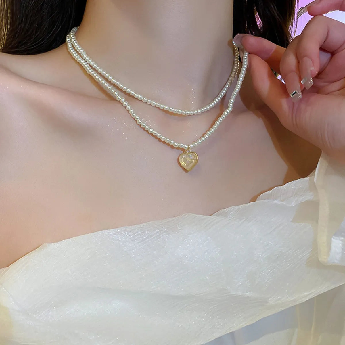 Elegant Heart Shape Flower Bow Knot Imitation Pearl Metal Beaded Inlay Rhinestones Women'S Necklace