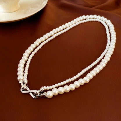 Elegant Heart Shape Flower Bow Knot Imitation Pearl Metal Beaded Inlay Rhinestones Women'S Necklace