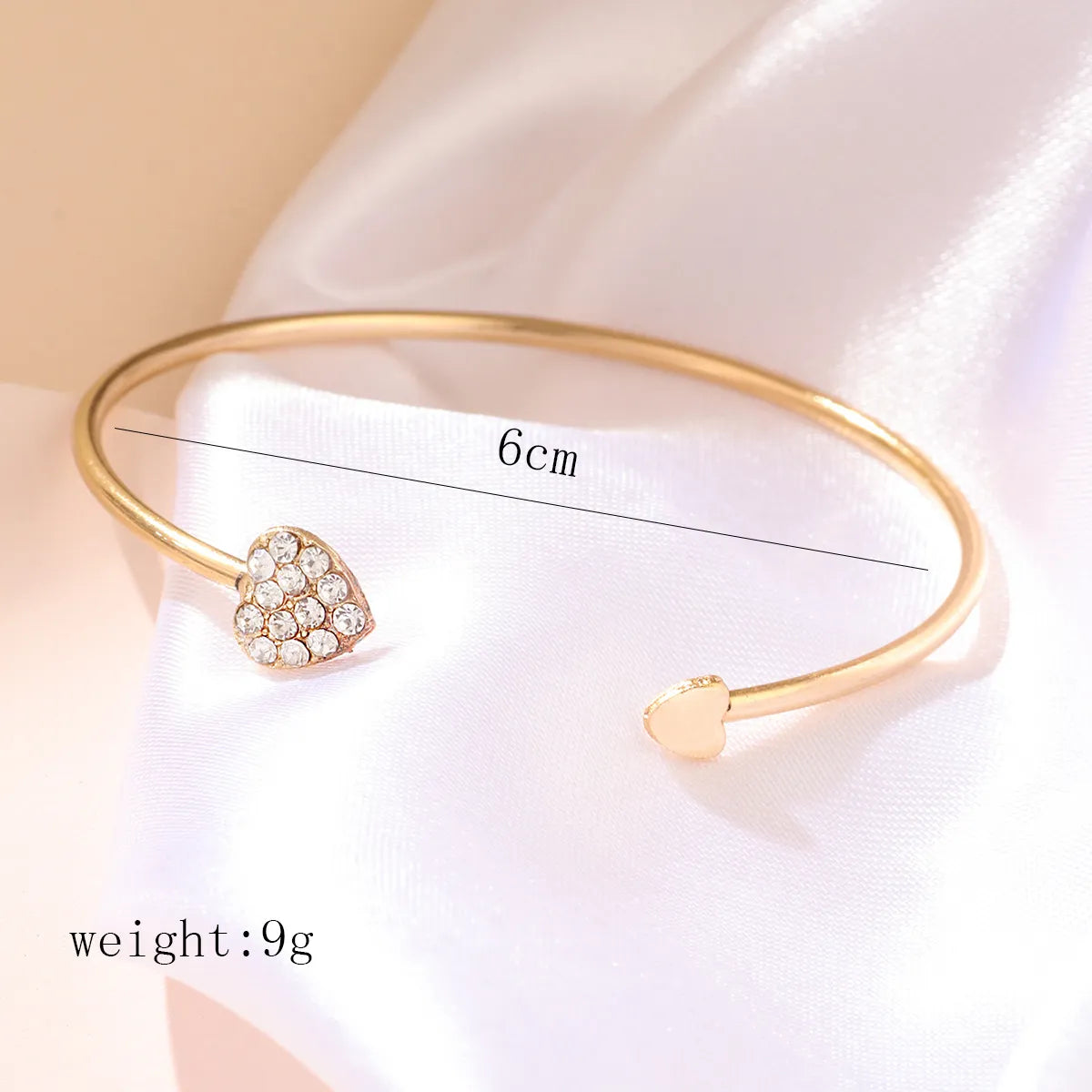 Elegant Heart Shape Twist Alloy Plating Inlay Rhinestones Rose Gold Plated Women'S Cuff Bracelets