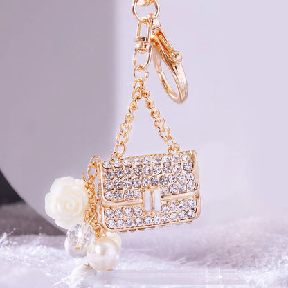 Elegant Korean Style Bag Metal Inlay Rhinestones Women'S Bag Pendant Keychain