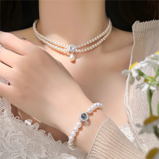 Elegant Lady Solid Color Artificial Pearl Copper Inlay Zircon Women'S Bracelets Necklace