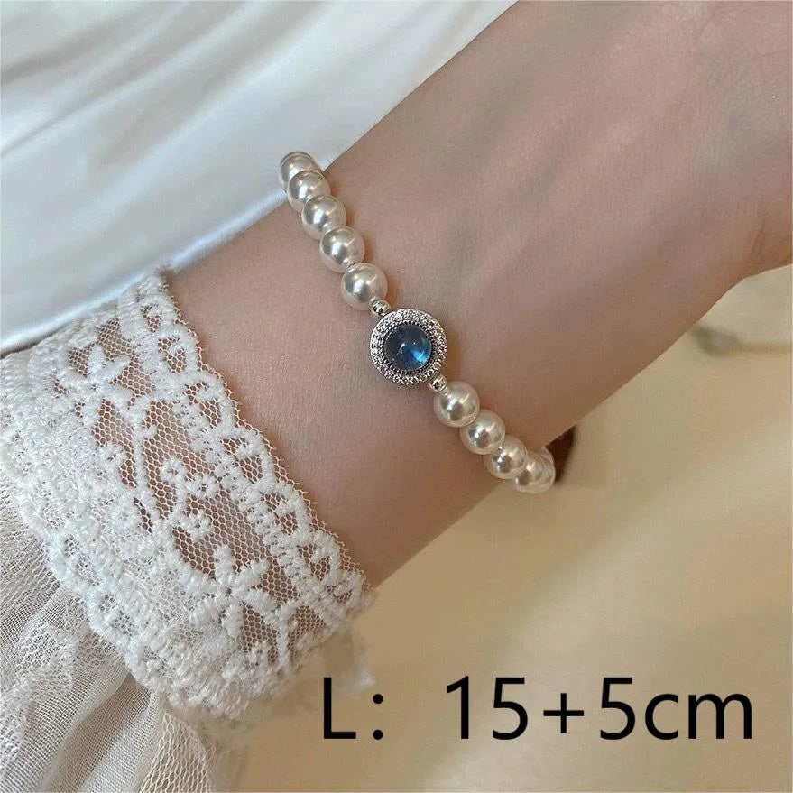 Elegant Lady Solid Color Artificial Pearl Copper Inlay Zircon Women'S Bracelets Necklace