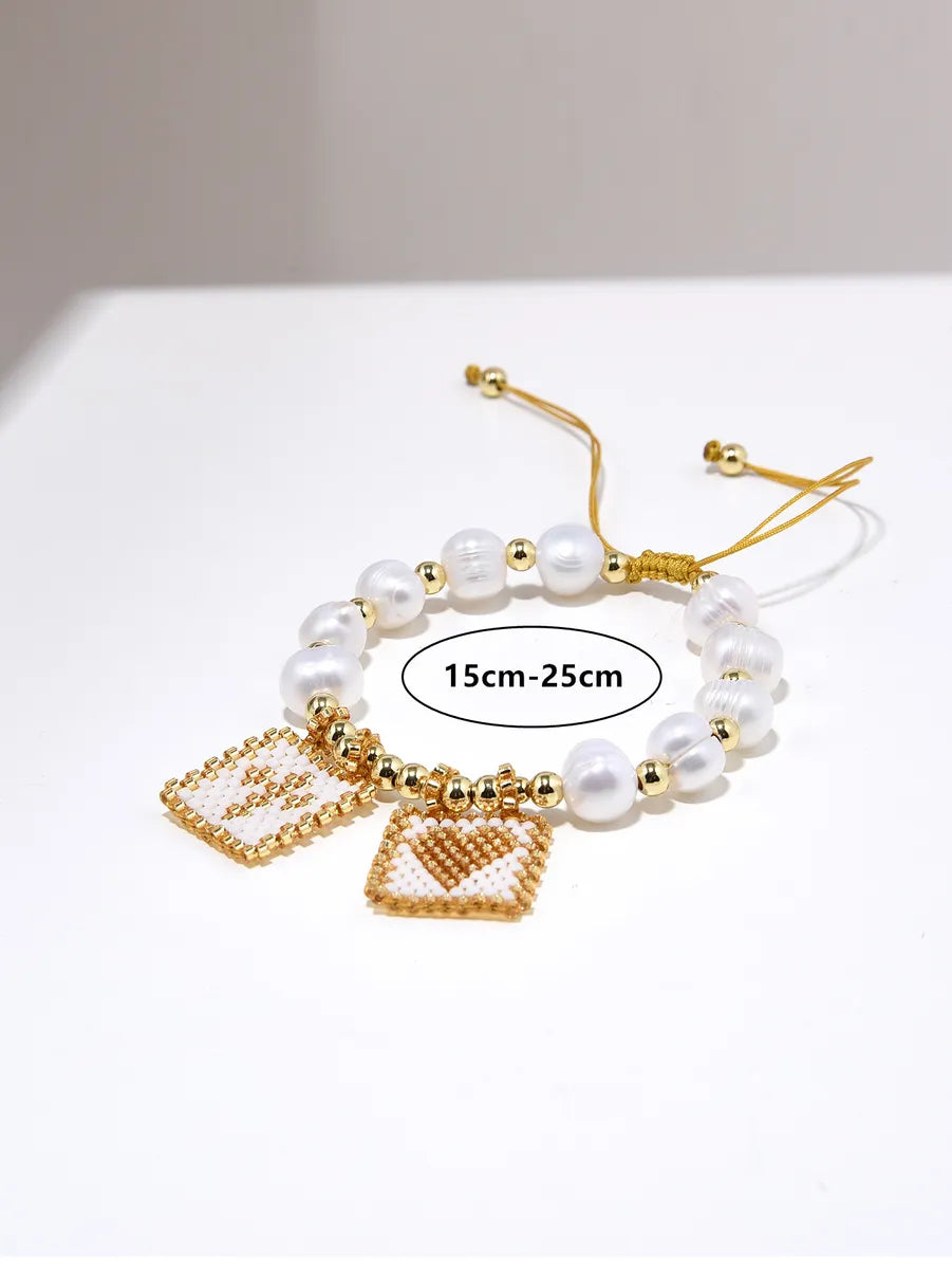 Elegant Simple Style Classic Style Cross Heart Shape Freshwater Pearl Plating Gold Plated Women's Bracelets