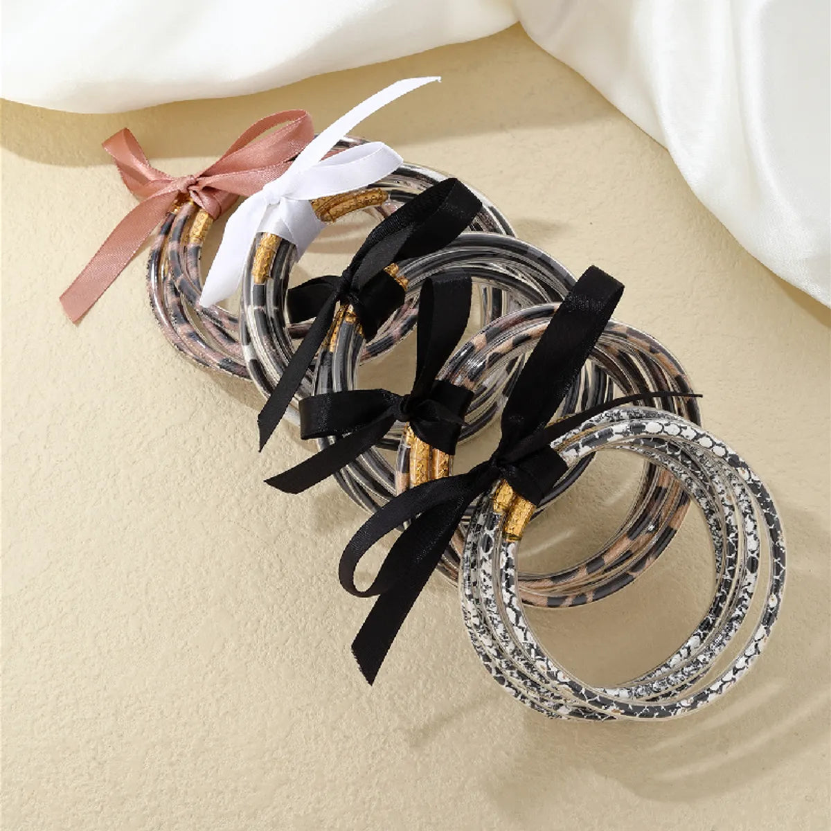 Wholesale Jewelry Elegant Simple Style Printing Bow Knot Silica Gel Braid Appliques Bangle