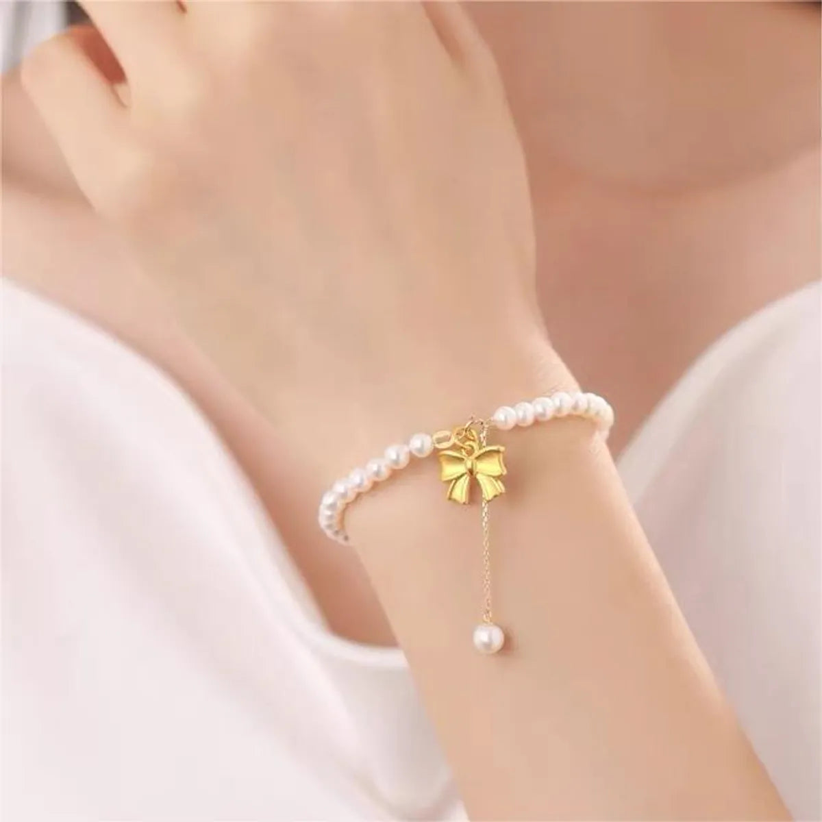 Elegant Sweet Bow Knot Imitation Pearl Copper Beaded Plating Women's Bracelets Necklace