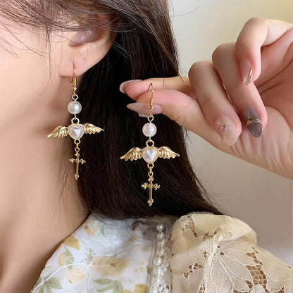 Ethnic Style Wings Alloy Plating Inlay Artificial Pearls Women's Drop Earrings Ear Clips