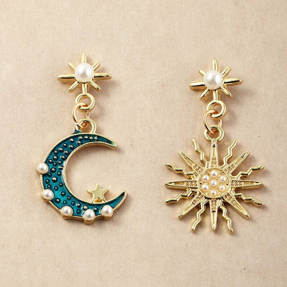 Fashion Alloy Inlaid Pearl Asymmetric Sun Moon Earrings