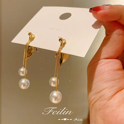 Fashion Alloy Leaf Pearl Tassellong Earrings Wholesale