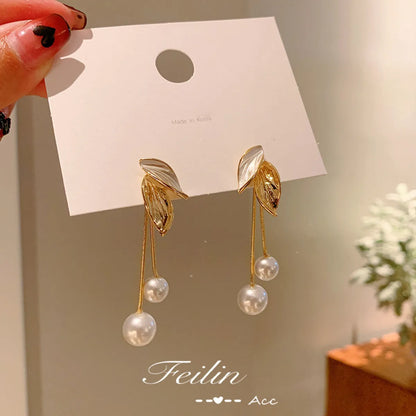 Fashion Alloy Leaf Pearl Tassellong Earrings Wholesale