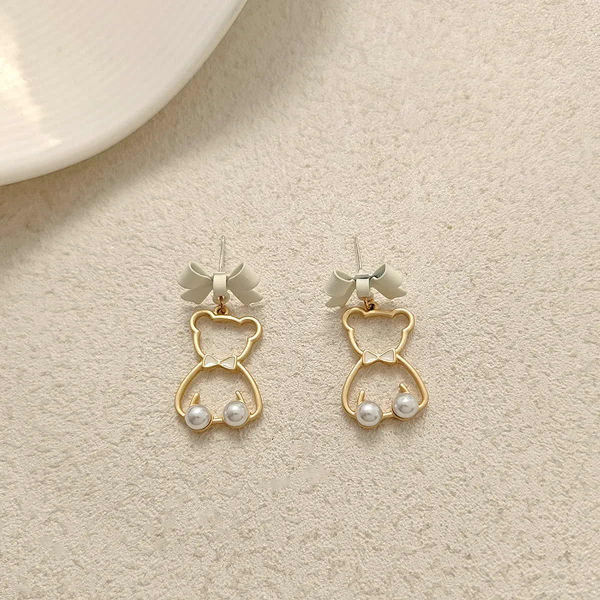 Fashion Animal Bow Knot Imitation Pearl Alloy Stoving Varnish Earrings