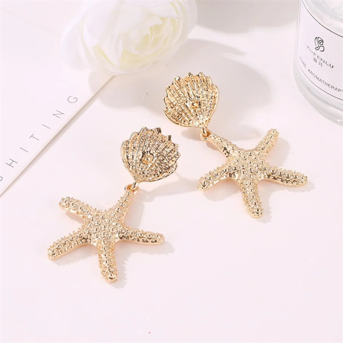 Fashion Creative Geometric Metal Star Shell Irregular Earrings Wholesale