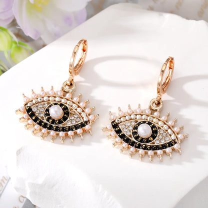 Wholesale Jewelry 1 Pair Fashion Devil's Eye Alloy Pearl Ear Studs