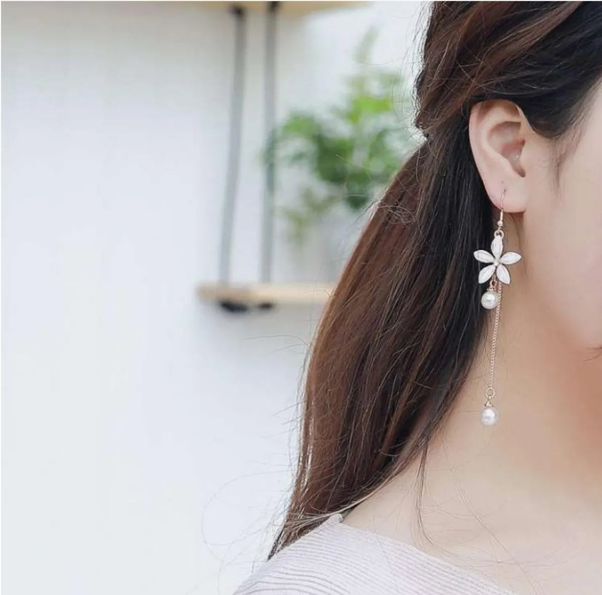 Fashion Flower Shaped Pearl Tassel Five-leaf Alloy Earrings