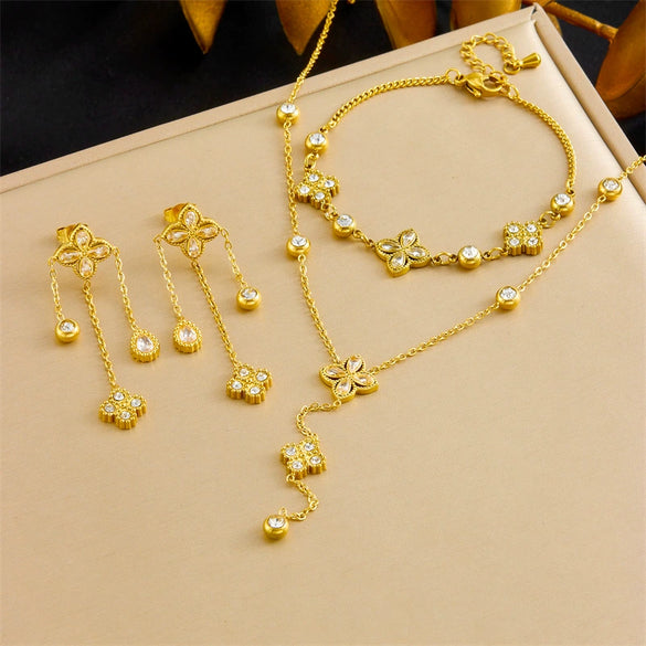 Fashion Four Petal Flower Tassel Chain Pendant Stainless Steel Bracelet Earrings Necklace Suit With Electroplating For Women