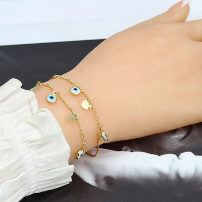 Fashion Geometric Devil's Eye Heart Shape Copper Artificial Pearls Bracelets